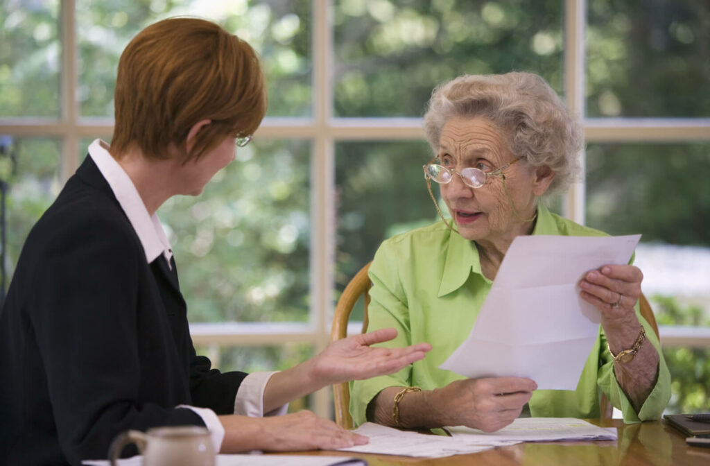 A mature woman with dementia is talking to her guardian about her properties.